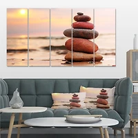 Stones Pyramid on Sand Symbolizing Zen Canvas Wall Art panels