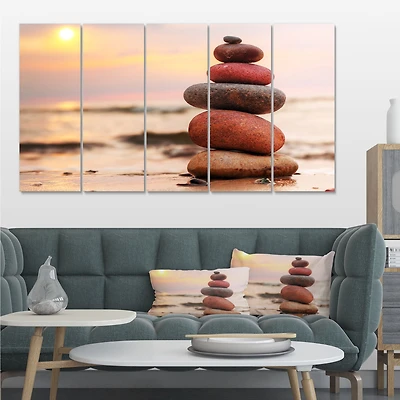 Stones Pyramid on Sand Symbolizing Zen Canvas Wall Art panels