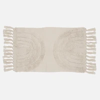Tapis capitonné à franges