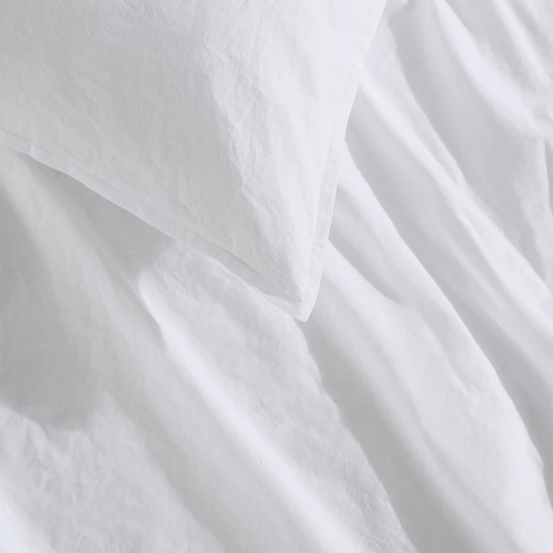 Ensemble de Housse couette solide en percale lavée par Calvin Klein