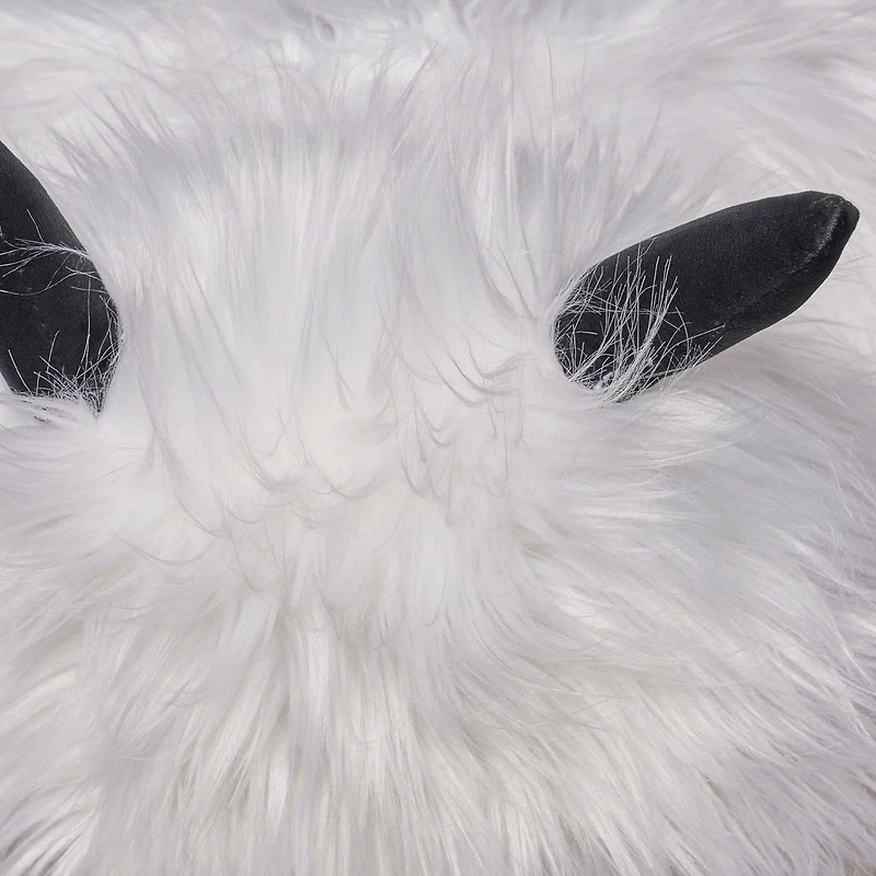 Pouf en faux yak blanc