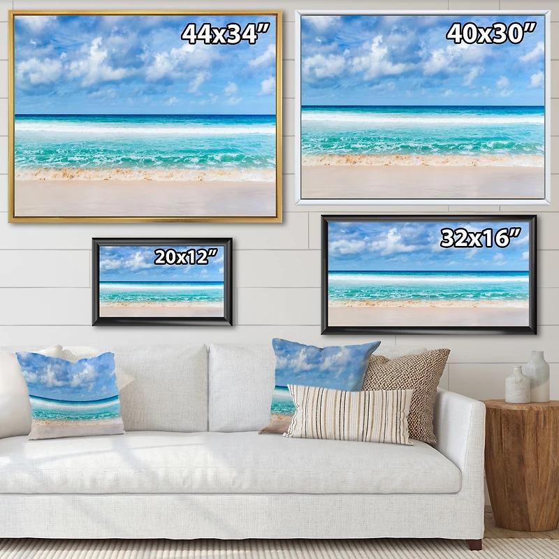 Tranquil Beach Under White Clouds  Canvas Artwork