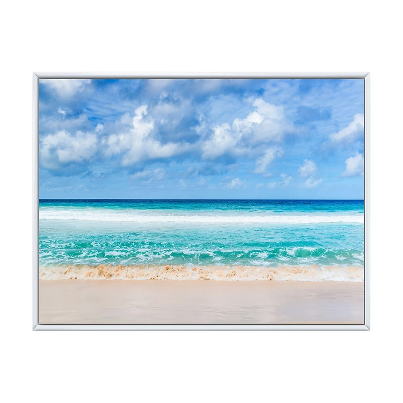 Tranquil Beach Under White Clouds  Canvas Artwork