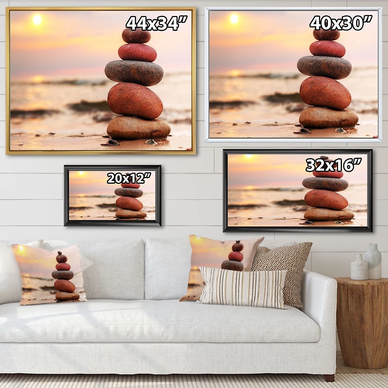 Toile « Stones Pyramid on Sand Symbolizing Zen »