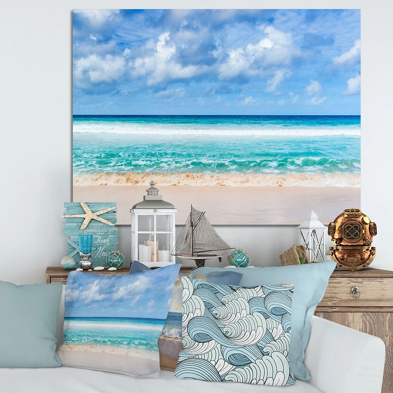Tranquil Beach Under White Clouds  Canvas Artwork