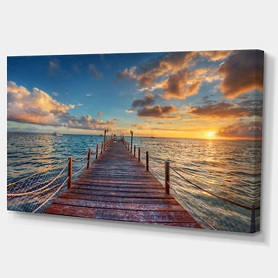 Toile « Brilliant Sunrise over Sea Pier »