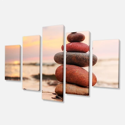 Stones Pyramid on Sand Symbolizing Zen Canvas Wall Art panels