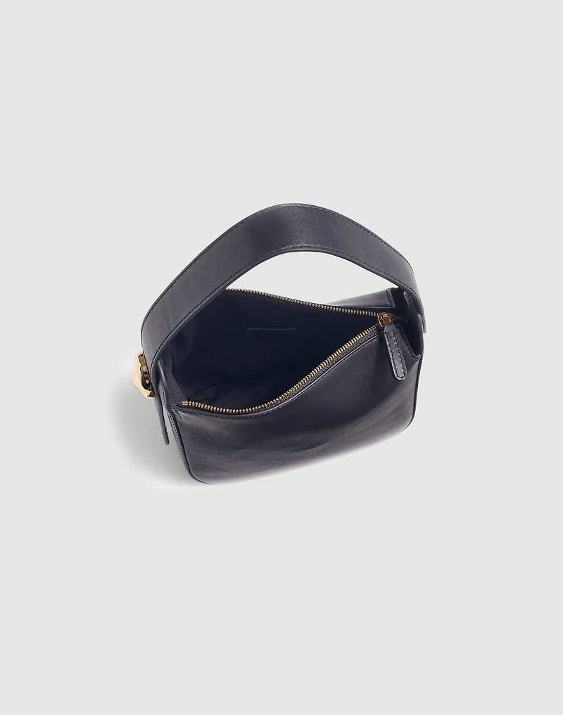 The Sculpted Metal Wristlet Bag