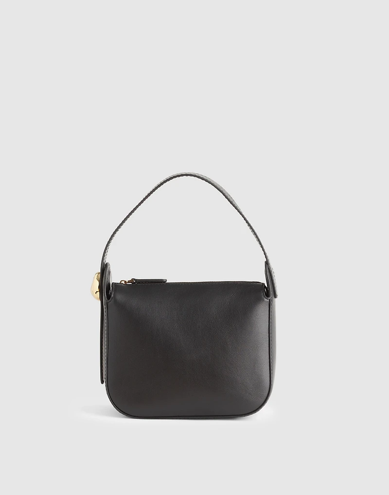 The Sculpted Metal Wristlet Bag