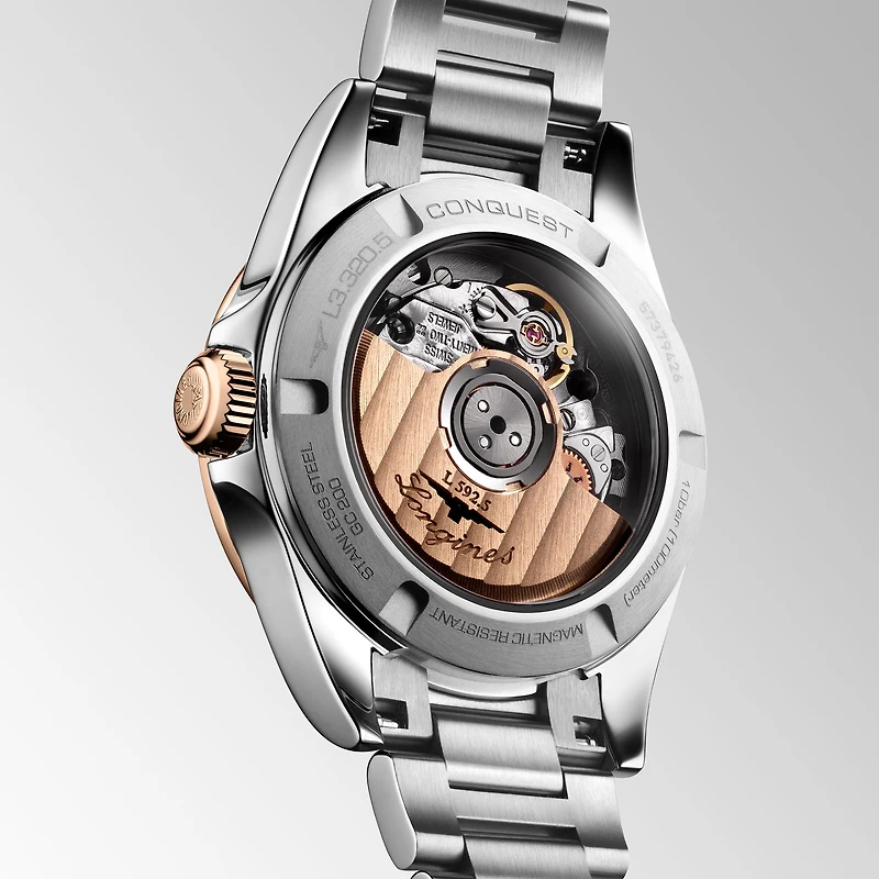 Conquest Automatic 30 mm Stainless Steel and Rose Gold Cap with Diamond