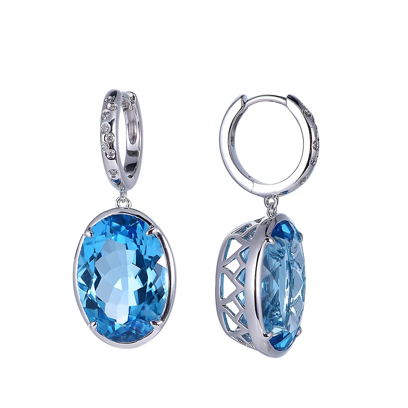 Oval Swiss Blue Topaz Earrings in White Gold