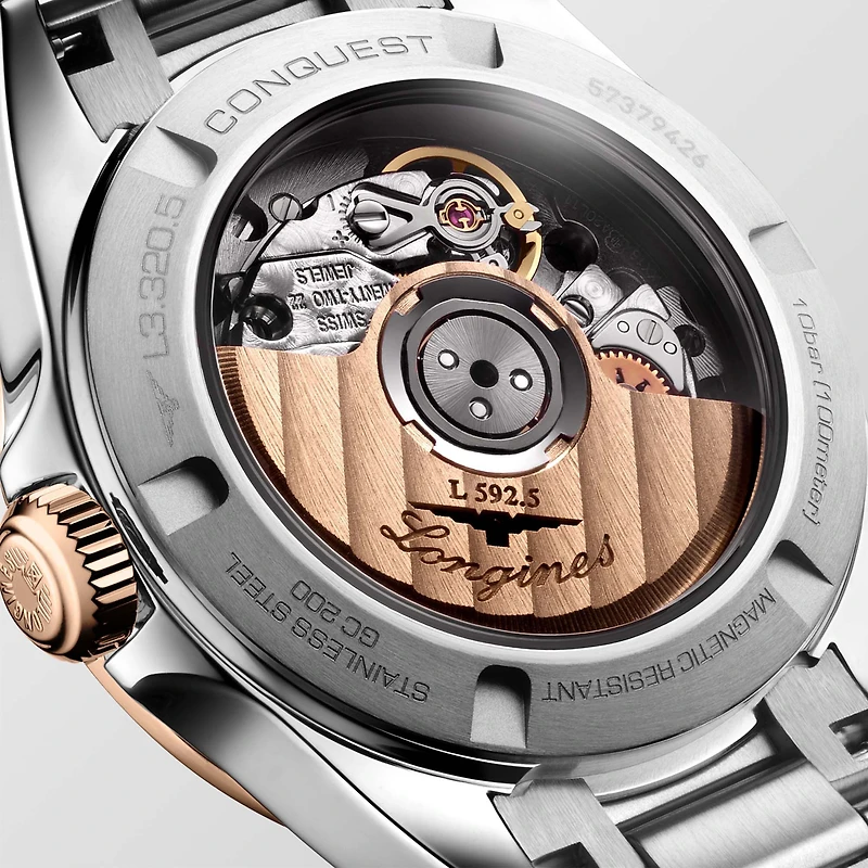 Conquest Automatic 30 mm Stainless Steel and Rose Gold Cap