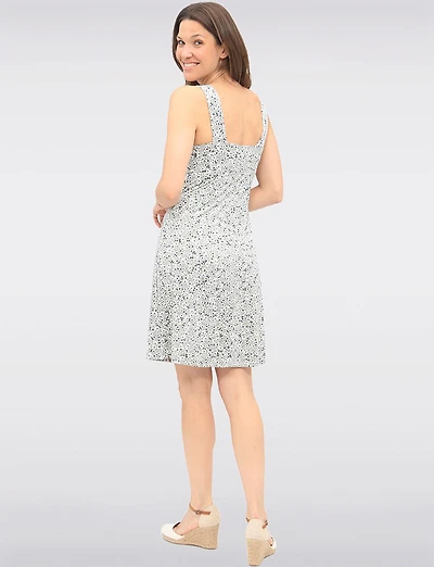 Robe Évasée à Fleurs Sans Manches Extensible à Longueur Genou par Amani Couture