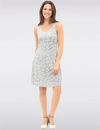 Robe Évasée à Fleurs Sans Manches Extensible à Longueur Genou par Amani Couture