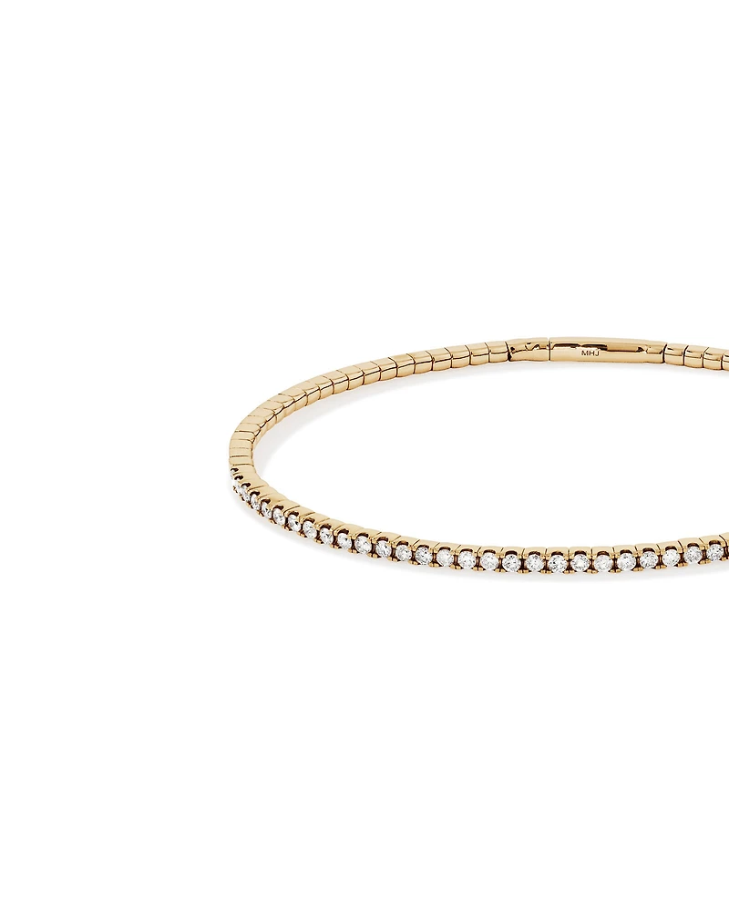 0.68 Carat TW Diamond Row Flex Bangle in 10kt Yellow Gold