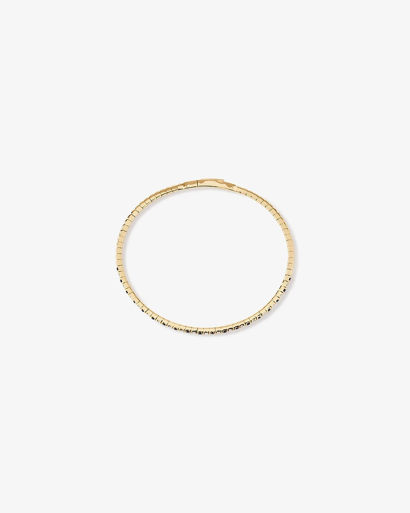 Bracelet flexible ovale avec diamants totalisant 0.35 carat et pierres précieuses saphir bleu en or jaune 10 carats