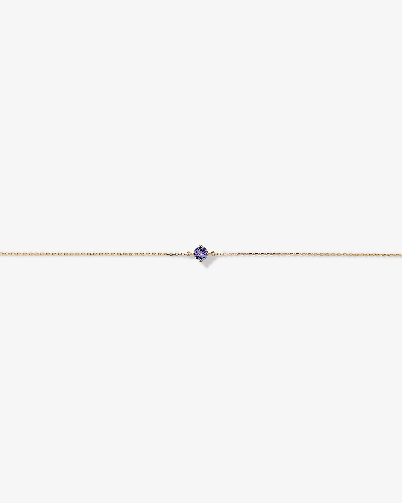 Boutons d'oreilles en or jaune 10 K avec tanzanite