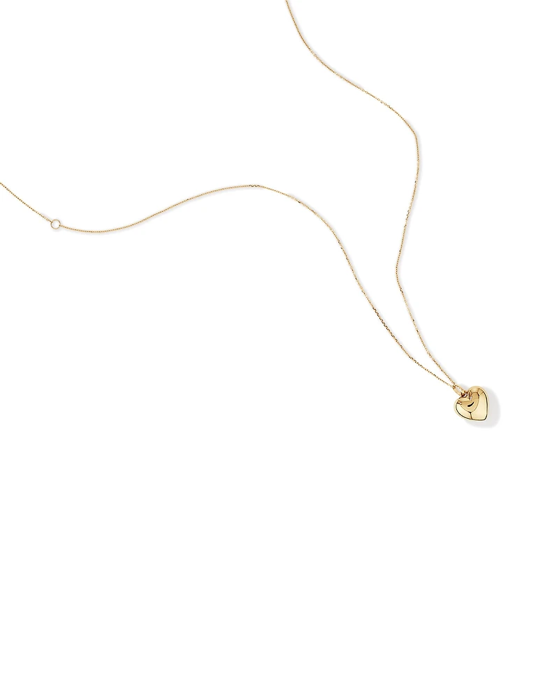 Petit pendentif de cœur en relief en or jaune 10 K