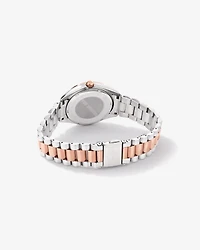 Women's 0.60 Carat TW Diamond Bezel Watch in Rose Tone Stainless Steel.