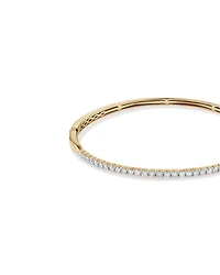 Bracelet jonc en or jaune 10 K avec diamants totalisant 1 ct