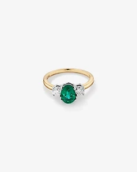 Bague en or blanc et jaune 14 K avec émeraude et diamants totalisant 0,40 ct