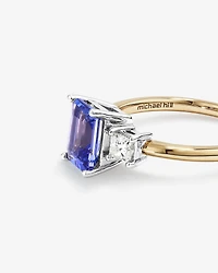 Bague en or blanc et jaune 10 K avec tanzanite et diamants totalisant 0,40 ct