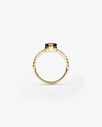Pear-Cut Garnet Chevron Ring and 0.25 Carat TW of Round Diamonds in 10kt Yellow Gold