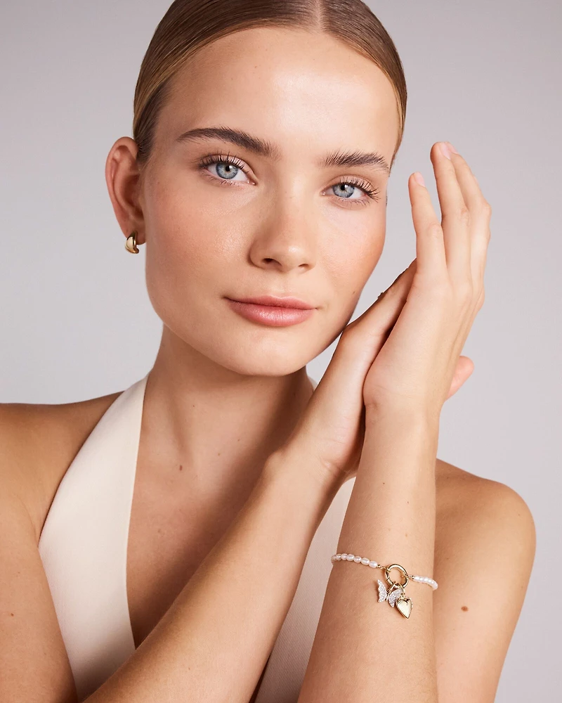 Bracelet à chaîne ouverte avec perles de culture d'eau douce de 3 à 3,5 mm en or jaune 10 carats