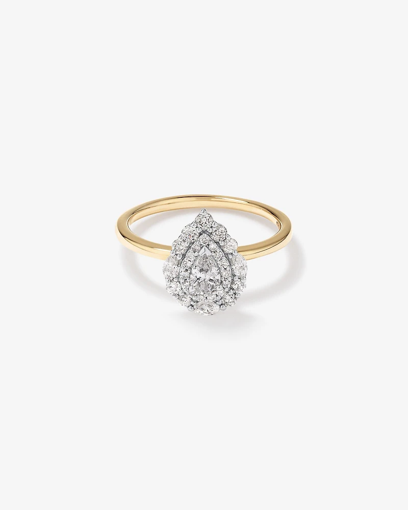 Bague de fiançailles halo en or jaune et blanc 14 carats avec diamant taille poire, marquise et brillant rond d'un poids total de 0,67 carat.