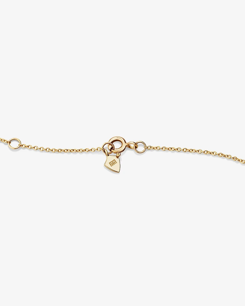 Collier en or jaune 10 K à tourmalines vertes et à diamants totalisant 0,14 ct