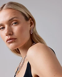 Boucles d'oreilles pendantes Huggie en forme de trombone en argent sterling