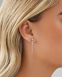 0,50 carat TW Boucles d'oreilles pendantes graduées en diamant en or blanc 18kt