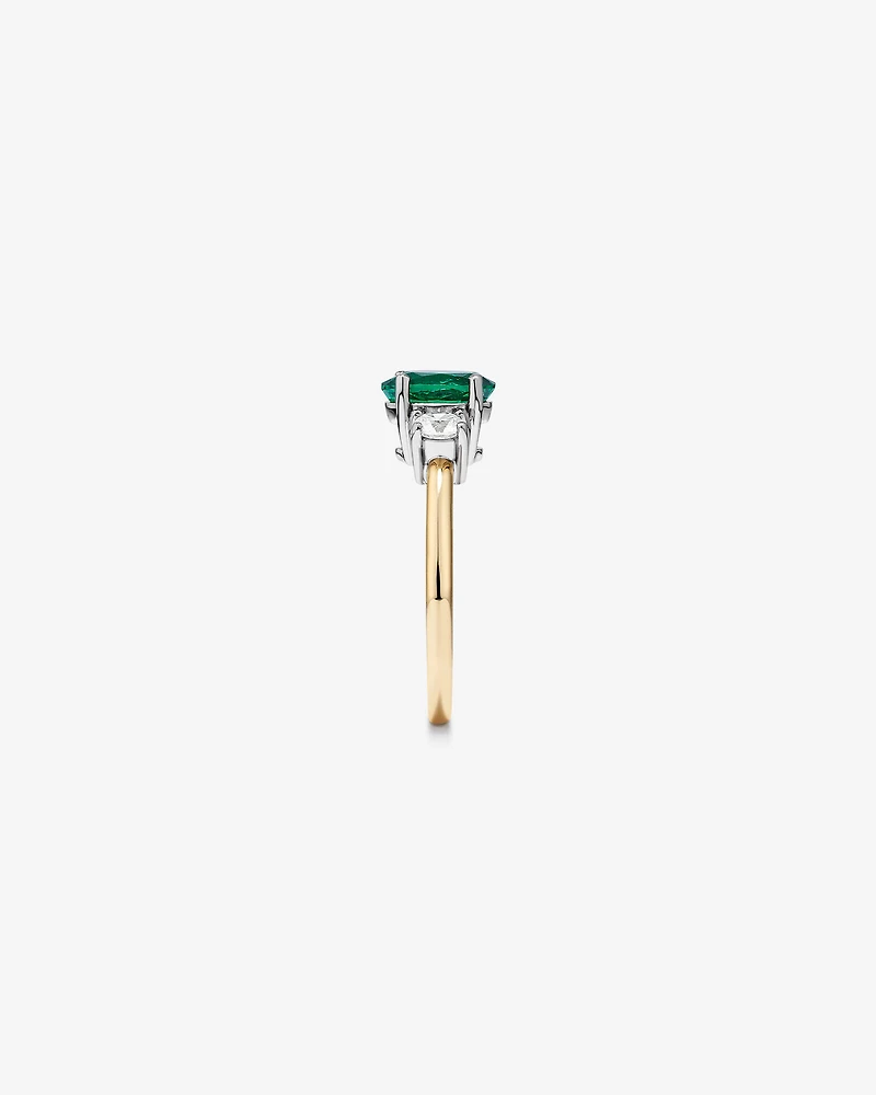 Bague en or blanc et jaune 14 K avec émeraude et diamants totalisant 0,40 ct