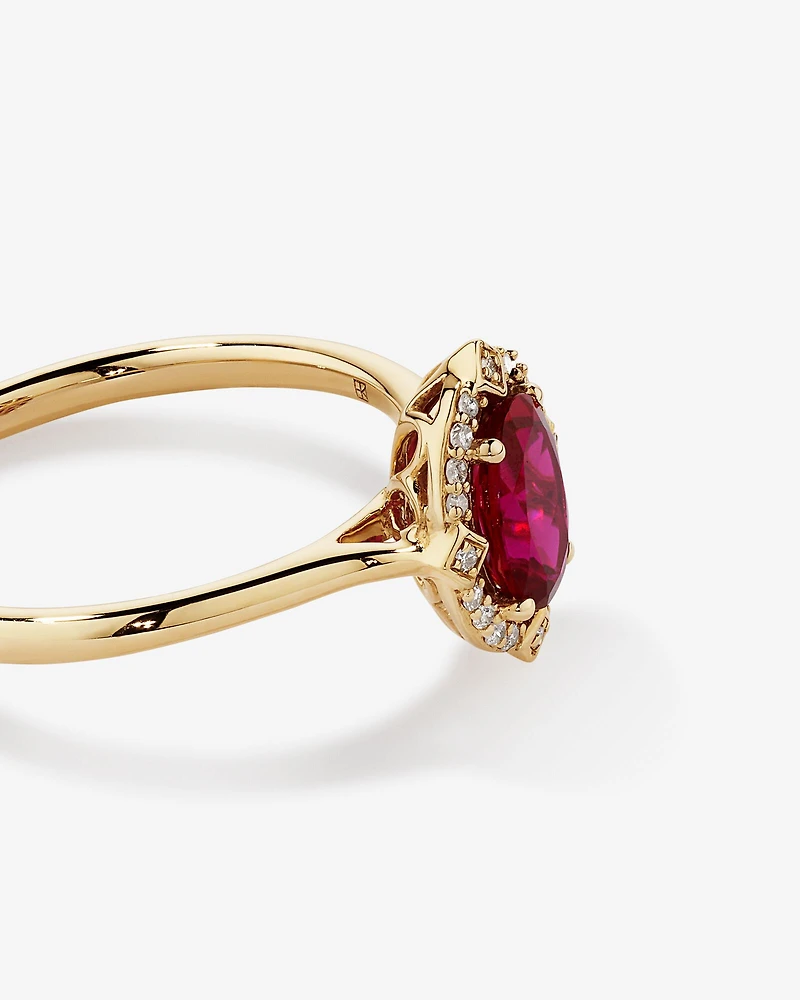 Bague halo en or jaune 10 kt avec rubis créé taille ovale et diamants