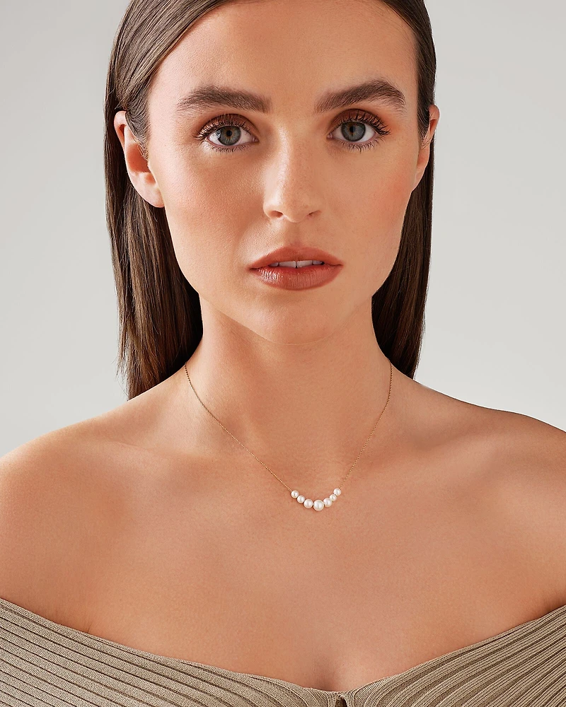 Collier en perle d'eau douce cultivée en or jaune 10 kt