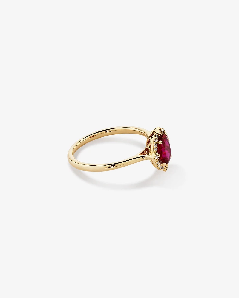 Bague halo en or jaune 10 kt avec rubis créé taille ovale et diamants