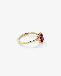 Bague halo en or jaune 10 kt avec rubis créé taille ovale et diamants