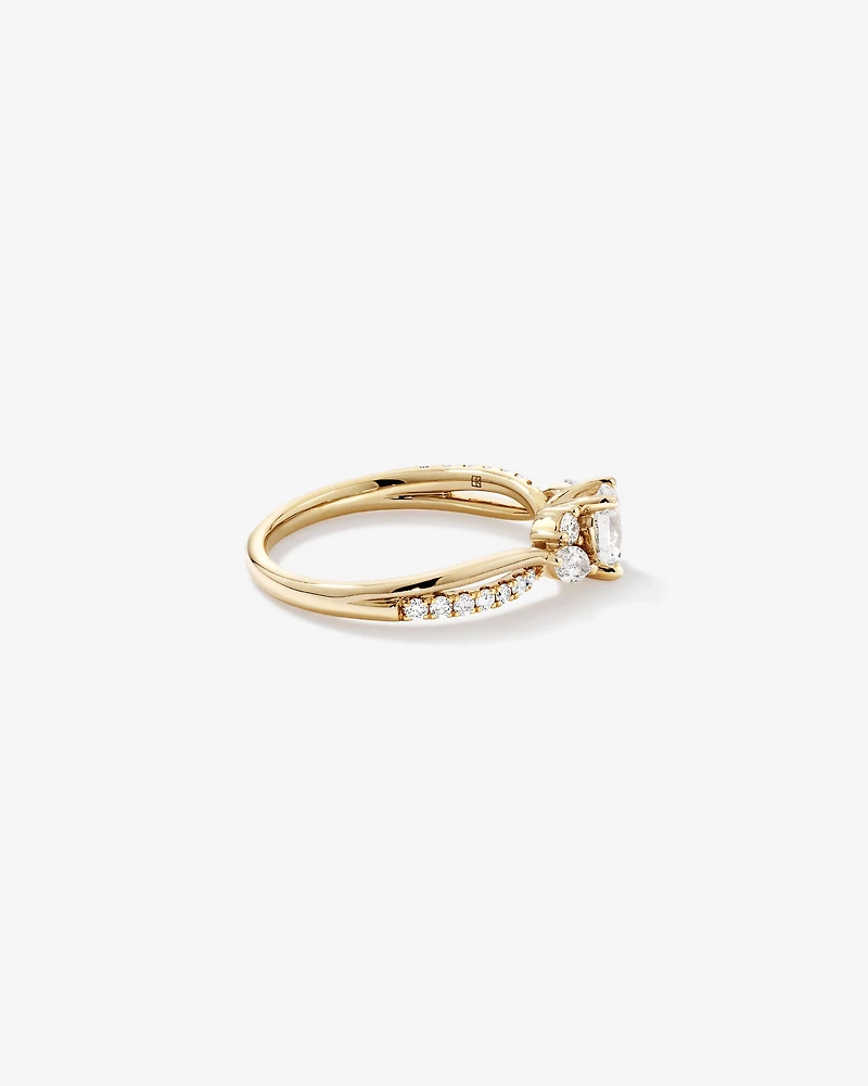0,83 carat TW bague de fiançailles torsadée avec diamants ovales et marquise en or jaune 14 carats
