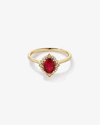 Bague halo en or jaune 10 kt avec rubis créé taille ovale et diamants