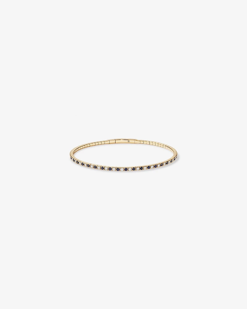 Bracelet flexible ovale avec diamants totalisant 0.35 carat et pierres précieuses saphir bleu en or jaune 10 carats