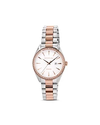 Women's 0.60 Carat TW Diamond Bezel Watch in Rose Tone Stainless Steel.