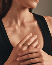 Bague enveloppante accentuée de diamants en or jaune 10kt