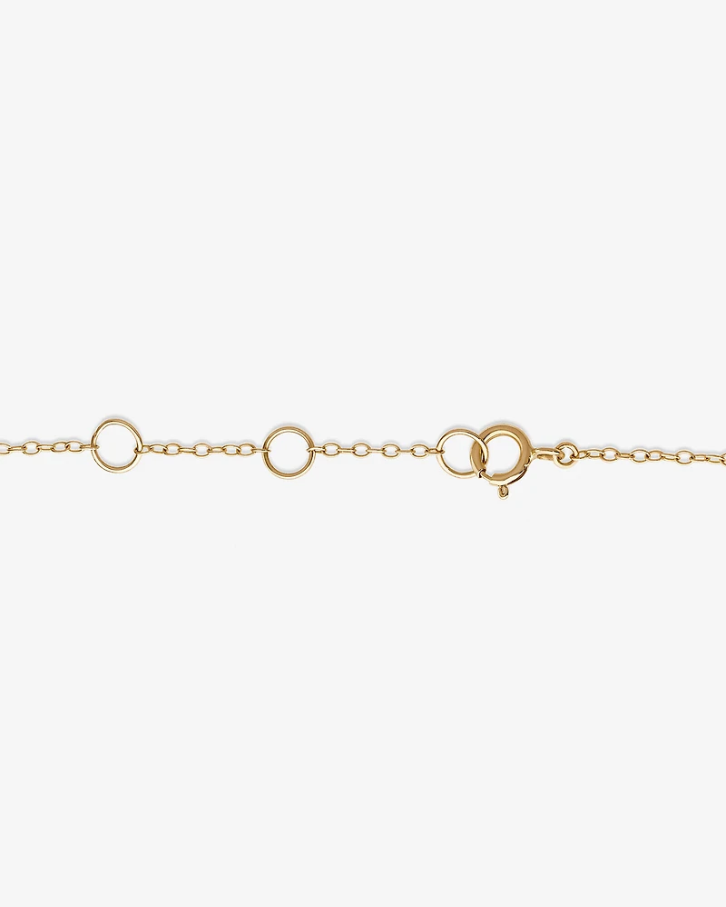 Bracelet en or jaune 10 K à diamants isolés totalisant 0,10 ct