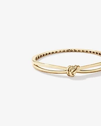 Bracelet ovale à bande fendue avec nœud en or jaune 10 kt