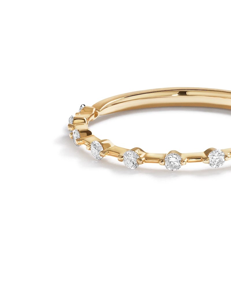 0.15 Carat TW Diamond Station Wedding Ring in 14kt Yellow Gold