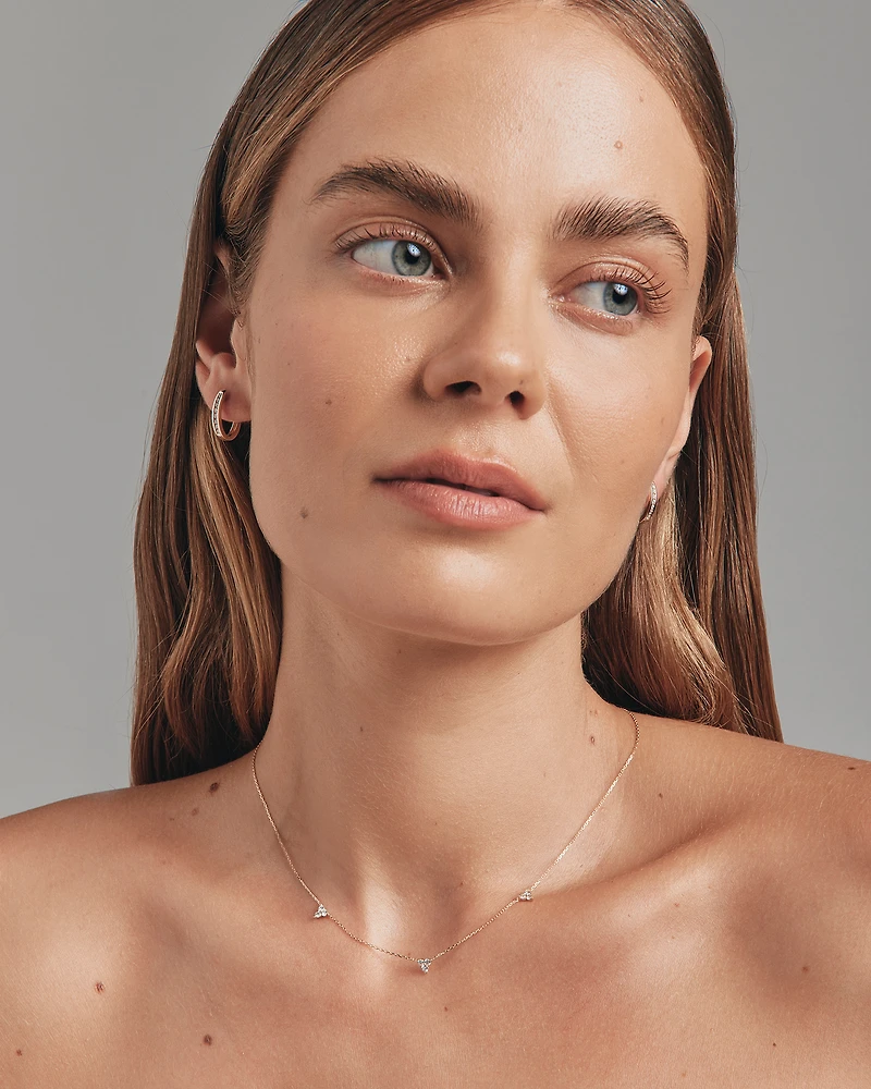 Huggie Earrings with 0.25 Carat TW of Diamonds in 10kt Yellow Gold