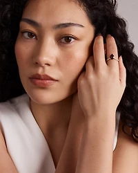 Pear-Cut Garnet Chevron Ring and 0.25 Carat TW of Round Diamonds in 10kt Yellow Gold