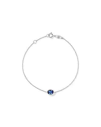 Oval Blue Created Sapphire Bezel Bracelet in 10kt White Gold
