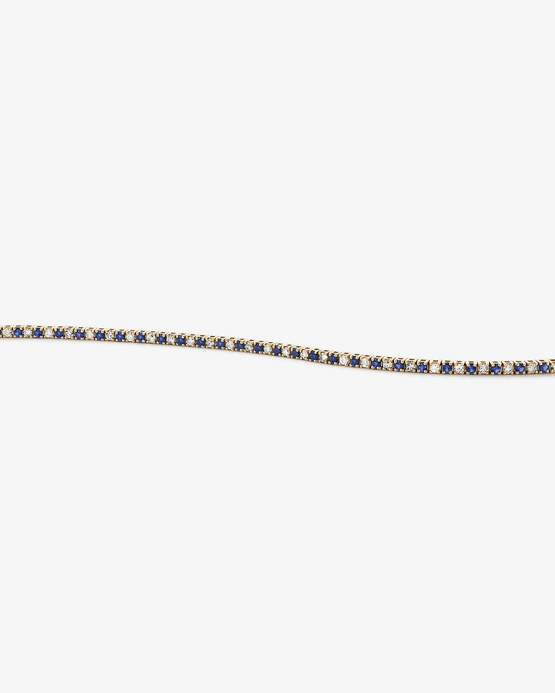 0.68 Carat TW Diamond and Created Sapphire Tennis Bracelet in 10kt Yellow Gold