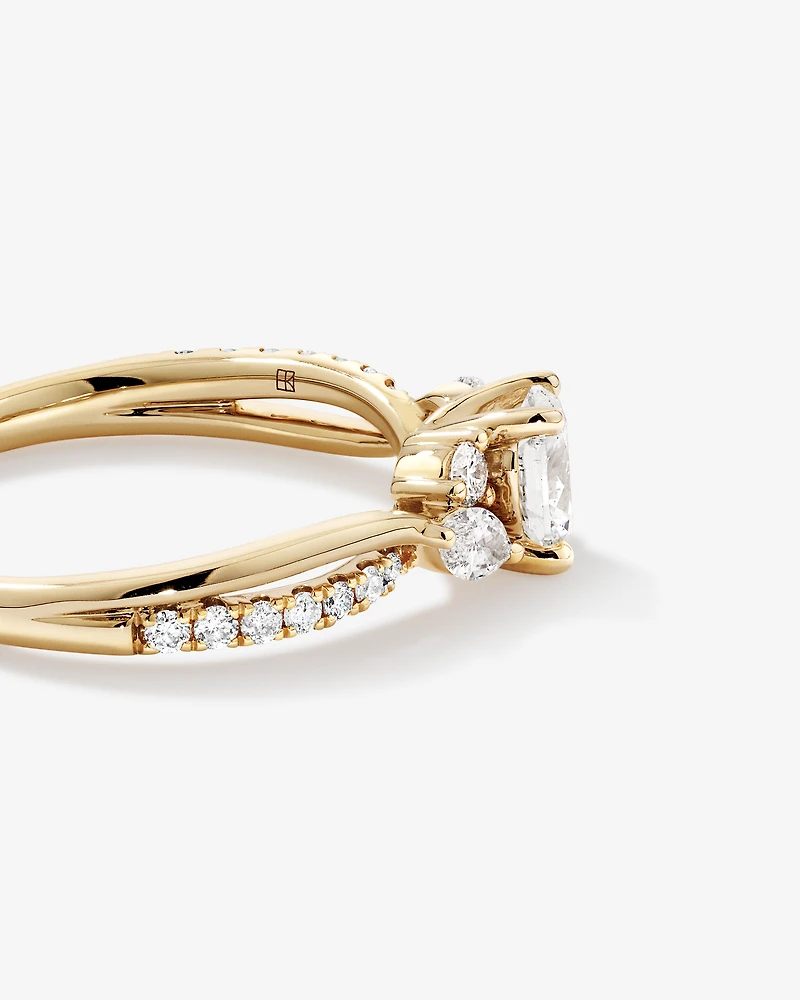 0.83 Carat TW Oval and Marquise Twist Engagement Ring in 14kt Yellow Gold